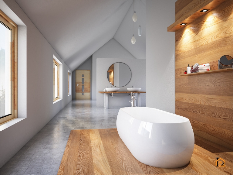 Jasna łazienka na poddaszu z wolnostojącą wanną i drewnianą podłogą